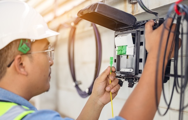 operater installing network equipment